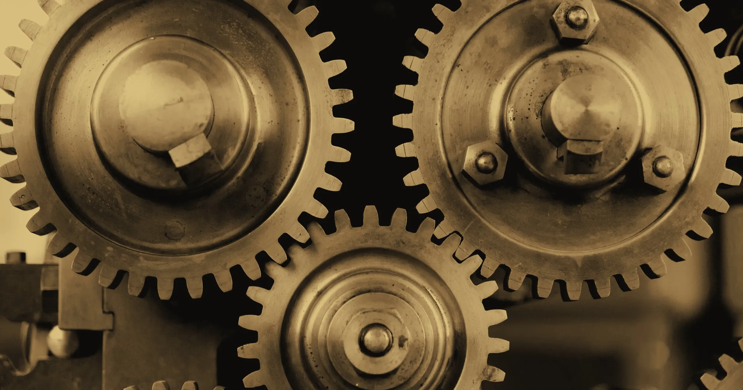 Interlocking metal gears of an old machine