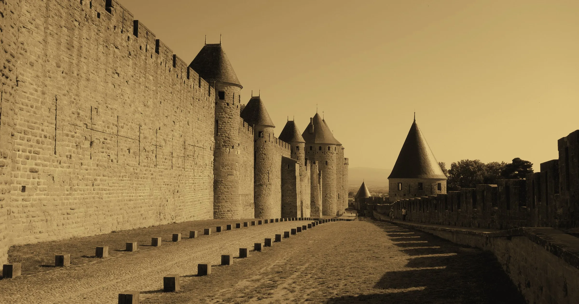 The long fortified walls and towers of Carcassonne