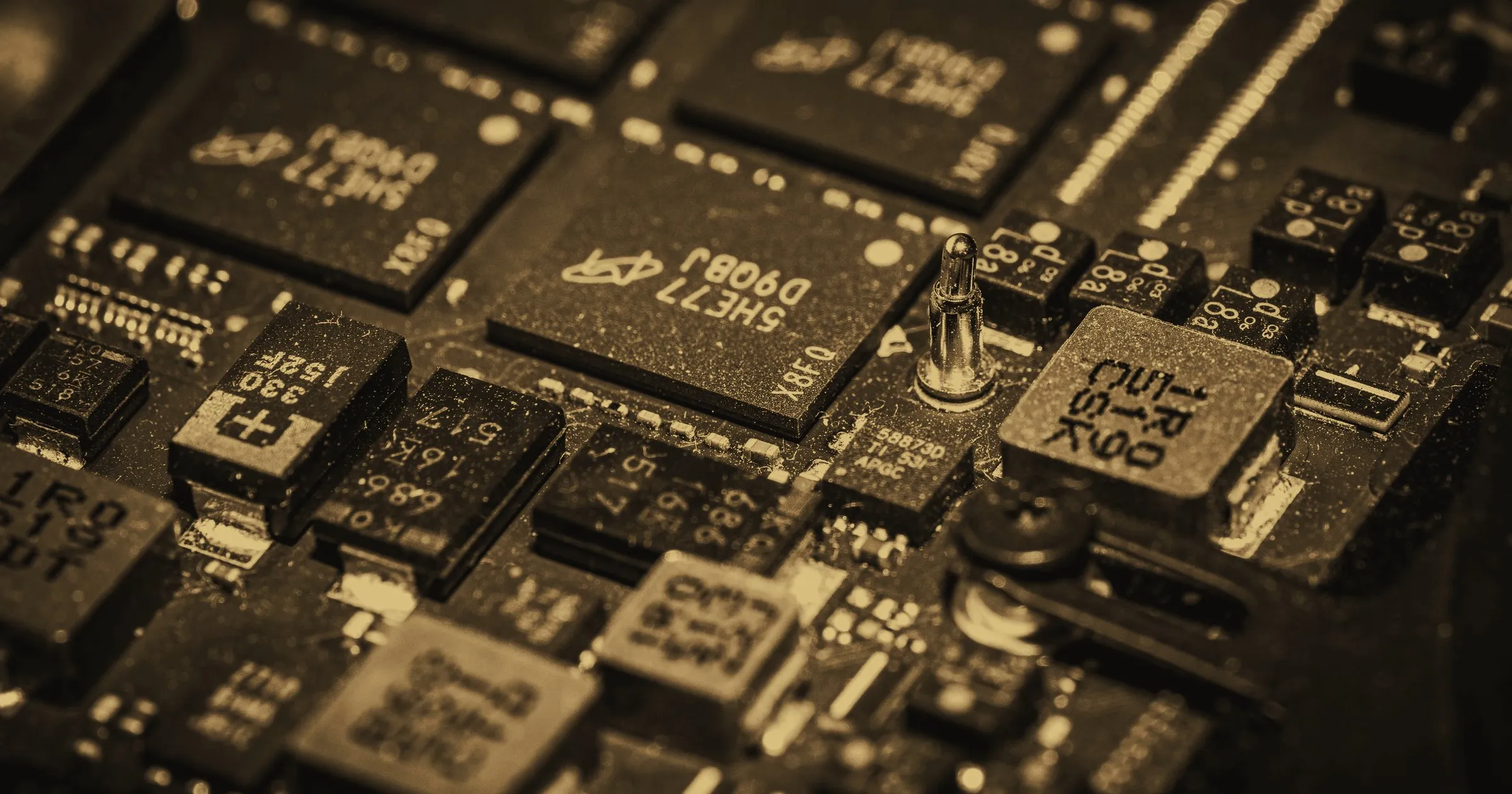Microchips on a circuit board, in close-up